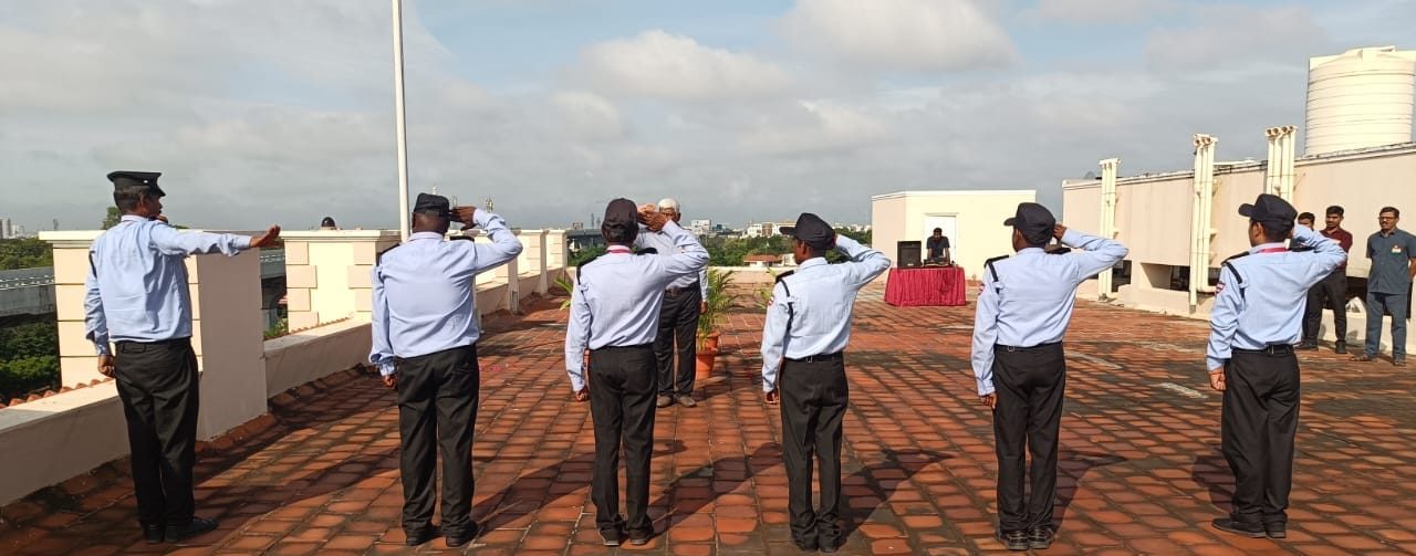 SV Security Services guards saluting the flag at the Independence Day ceremony in Coimbatore.