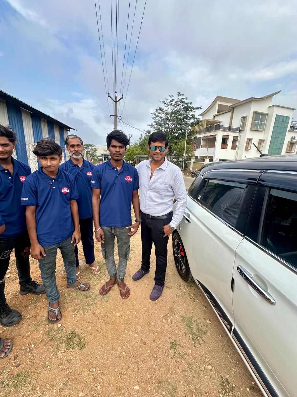 SV Manpower Solutions supervisor with deployed staff during a site visit.